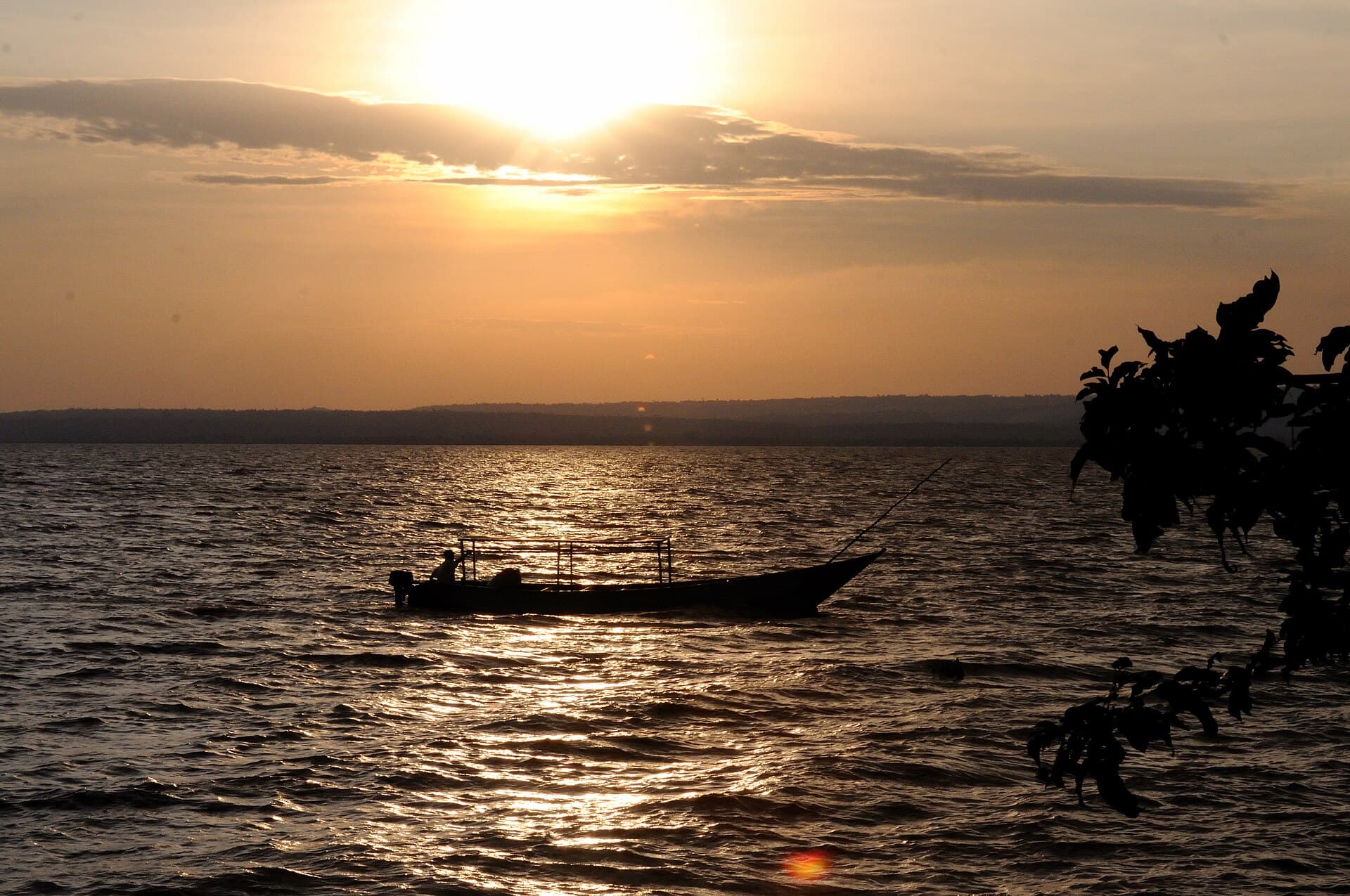 A boat on Lake Victoria at sunset, seen from Kisumu